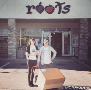 Roots Market - sign and employees.png