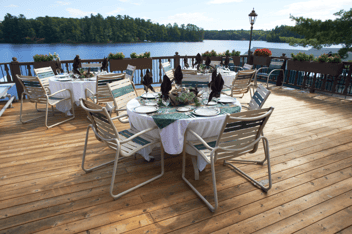 Minnesuing Acres - Dining on the deck overlooking Lake Nebagamon.png