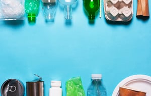 Household-waste-on-a-blue-background.-1058519598_2177x1382