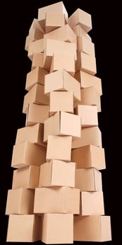 iStock_13070579_LARGE cardboard box tower black background.jpg